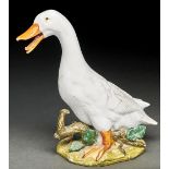 A Staffordshire earthenware model of a goose, late 19th c,  27cm h Slight wear to the enamels