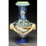 A French Palissy ware vase, late 19th c,  applied with festoons and lion mask handles and, to either