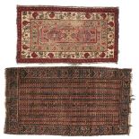 An antique Caucasian rug, 70 x 125cm and another (2) Both with some localised wear