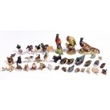 Miscellaneous Beswick, Royal Doulton and other modes of birds and animals, various sizes, printed