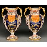 A pair of Davenport Japan pattern bone china two handled vases, late 19th c, of shield shape with