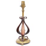 An English arts and crafts early electric brass and copper table lamp, early 20th c, 28cm h