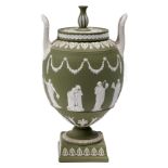 A Wedgwood green Jasper vase and cover, 20th c, sprigged with muses beneath festoons, 30cm h,