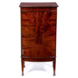 A George V bow fronted mahogany music cabinet, 100cm h; 44 x 53cm Good condition
