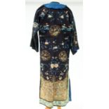 A Chinese embroidered silk robe, early 20th c, approximately 130cm