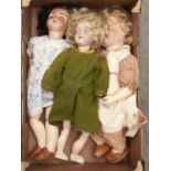 An SFBJ bisque headed character doll and two Armand Marseille bisque headed character dolls, early