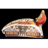 A Royal Crown Derby Harrods Pheasant paperweight, commissioned by Doulton and Co on behalf of