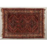 An antique Caucasian rug, 112 x 172cm Localised wear