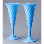 A pair of Victorian spirally fluted cobalt blue glass trumpet vases, late 19th c, 30cm h Both in