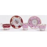 An H & R Daniel claret ground teacup and saucer and pink ground trio, c1827, of C-scroll shape,