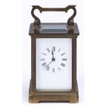 A French brass carriage timepiece, early 20th c,  11cm h excluding handle, leather case Brass dirty;