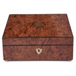 A Charles X burr maple work box, the lid inset with a brass shield engraved with monogram, the red