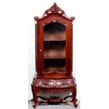 A carved mahogany cabinet in rococo style, 200m h; 46 x 86cm One or two small scratches