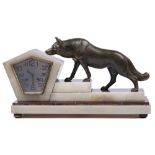 A French art deco marmo griotte rouge, onyx and spelter mantel clock, with silvered kite shaped