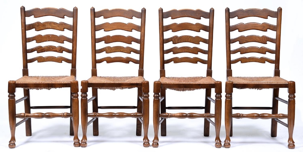 A set of four stained ash ladder back chairs, 19th c style, rush seated, seat height 45cm Handling