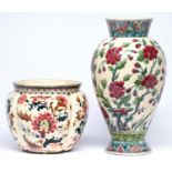 A Zsolnay vase and jardiniere, late 19th c, decorated with tree peonies or other stylised flowers,