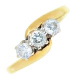 A three stone diamond ring, in 18ct gold, 4.4g Good condition