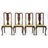 A set of four walnut dining chairs, early 20th c,  with spoon splat, on cabriole legs, seat height