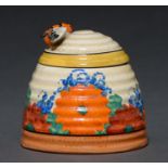 Clarice Cliff. An A J Wilkinson Gayday honey pot and cover, 1930, 90mm, printed mark Good condition,