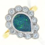 A tear shaped black opal doublet and diamond cluster ring, in 18ct gold, 4.6g, size O½ Good