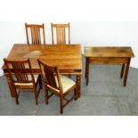 A South East Asian hardwood dining table,   on turned legs and a set of four chairs, seat height