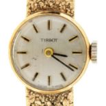 A Tissot 9ct gold lady's wristwatch, 17mm, on 9ct gold tapered mesh bracelet, Birmingham 1966, 23g