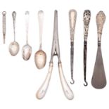 Two pairs of silver handled button hooks, a similar shoe horn and pair of glove stretchers,