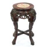 A Chinese hardwood stand, first half 20th c, with marble inset top and carved with bamboo, 48cm h,