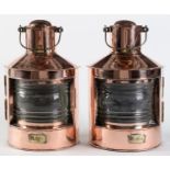 A pair of Dutch copper and brass ship lamps, early 20th c, 35cm h excluding handle, stamped brass