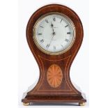 An Edwardian inlaid mahogany balloon shaped mantel clock, c1910, the waisted case with oval, on