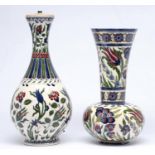 Two similar Zsolnay vases, late 19th c, with Iznik style floral decoration, 33 and 37cm h, impressed