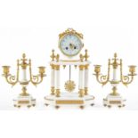 A French statuary marble and ormolu garniture de cheminee, early 20th c, in Louis XVI style, the
