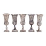 A set of five Edwardian silver kiddush cups, 10cm h, by Jacob Fenigstein, London and elsewhere, 1904