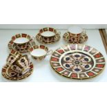 Two Royal Crown Derby Imari pattern plates and a quantity of teaware, late 20th c, plates 26.5cm