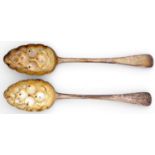 A pair of Victorian silver tablespoons, Old English pattern, later chased and gilt as berry