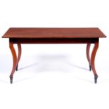 A Northern European mahogany table, 19th c, the oblong top with chamfered edge and rounded