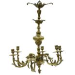 A brass chandelier, 19th c, in Louis XV style, the six leafy scrolling branches with conforming