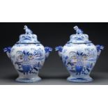 A pair of Staffordshire blue and white chinoiserie Ironstone jars and covers, probably Masons,