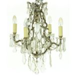 A glass and plated metal four branch chandelier, 20th c, in French 18th c style, festooned with