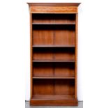 A mahogany and inlaid open bookcase, 20th c, in neo classical style, with adjustable shelves,