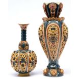Two Zsolnay double walled, reticulated vases, late 19th c, decorated in a similar palette of