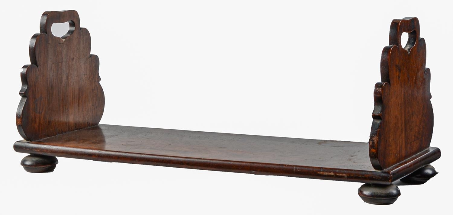 A rosewood book-carrier, on turned feet, 52cm l Good condition, made up from 19th c timber