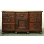 A Victorian stained pine breakfront dresser, on turned feet, 88cm h; 55 x 149cm Original condition