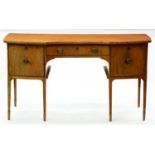A George III mahogany sideboard, crossbanded and line inlaid throughout, on six square tapered legs,