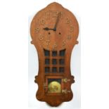 A Ramona oak wall clock, manufactured by the Sessions Clock Company, Forestville, Connecticut USA,