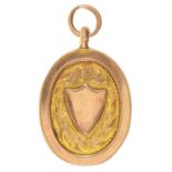 An oval 9ct gold cricket prize fob medal, 32mm, Birmingham 1929, 3.5g Good condition