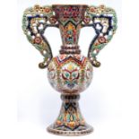A Zsolnay vase, late 19th c, of Persian inspiration, decorated with shaped panels of stylised