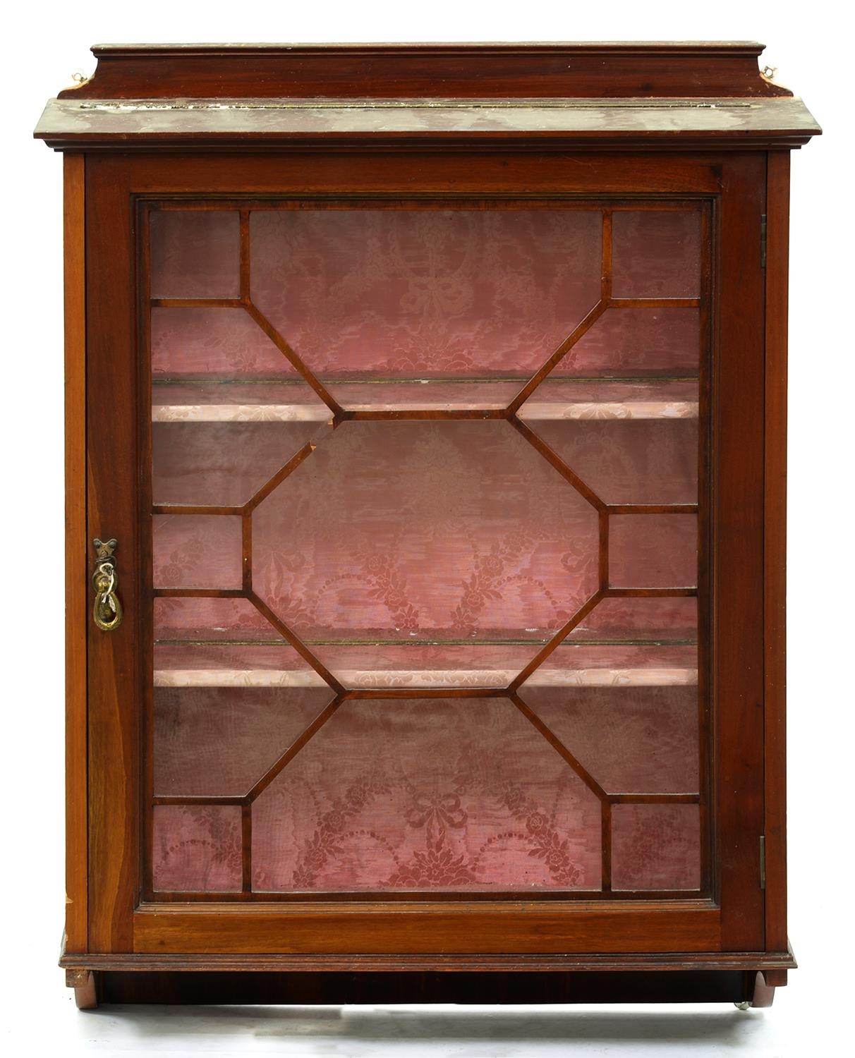 An Edwardian mahogany hanging cabinet,  with glazed door, 99cm h; 23 x 74cm Damage to one of the