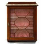 An Edwardian mahogany hanging cabinet,  with glazed door, 99cm h; 23 x 74cm Damage to one of the