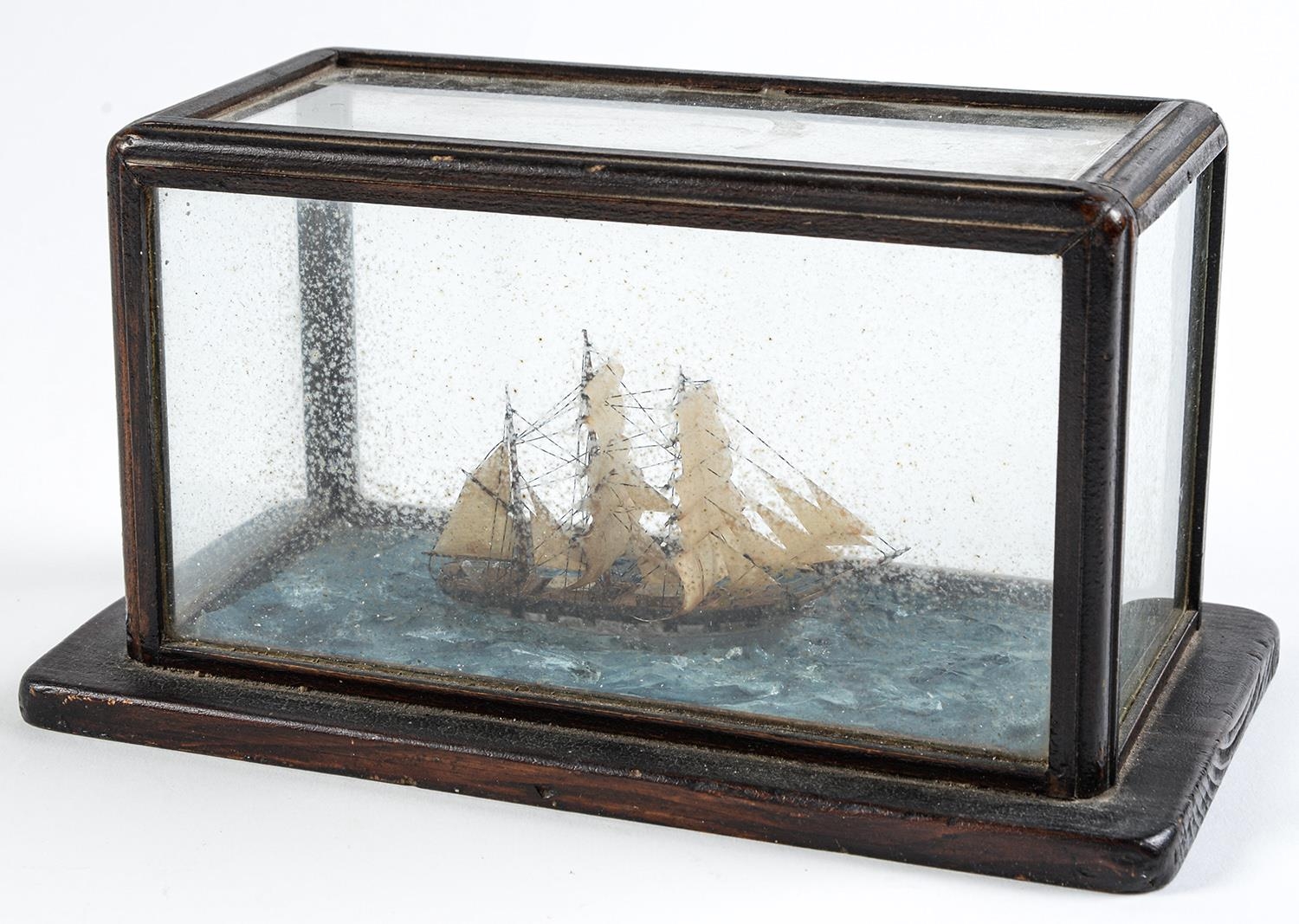 A wood and painted ship diorama, 20th c, in earlier style, base 26cm l Much dirt but intact
